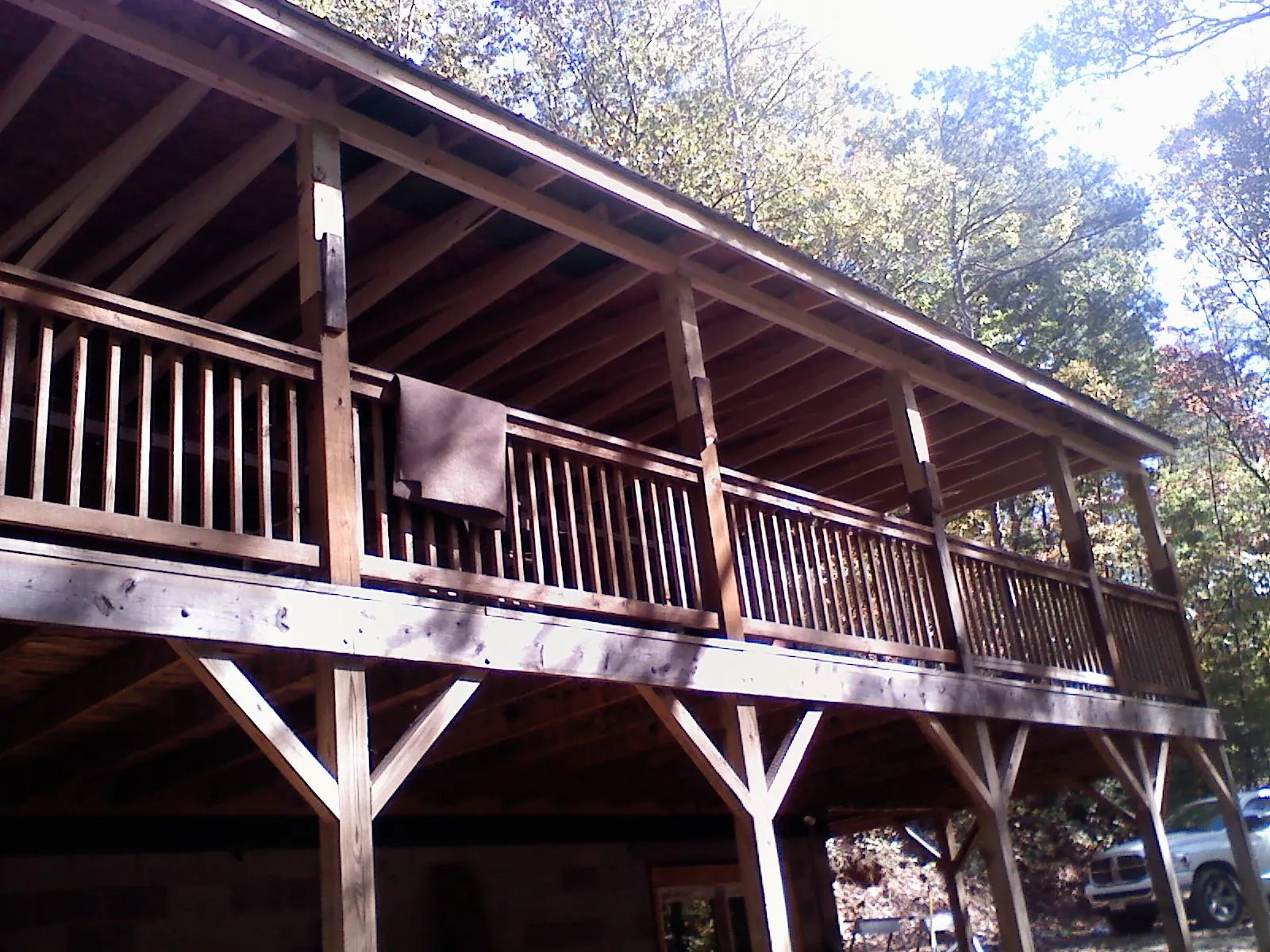 Timber framing under a new elevated porch and deck — Roof Leak Repair in Grimesland by Roofing Brothers
